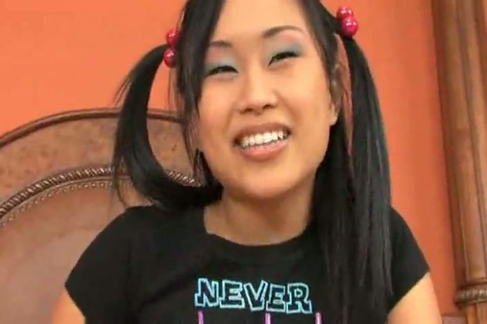 Happy asian teen masturbates her pussy