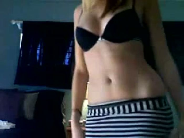 Blonde undressing on webcamera